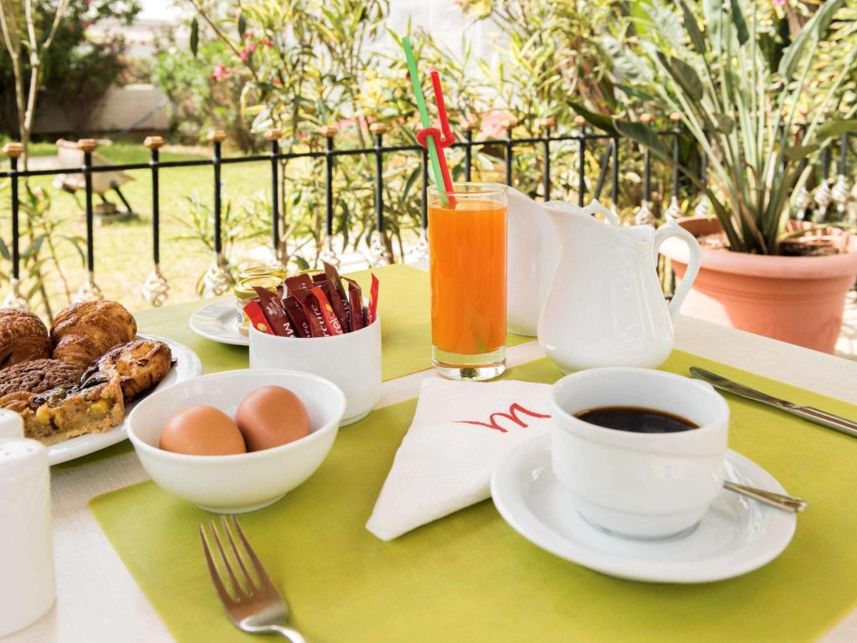 โรงแรมแกรนด์โฮเต็ลเมอร์คูเร่อัลเจอร์ แอร์โร่พอร์ท Maison Blanche ภายนอก รูปภาพ A typical Italian breakfast