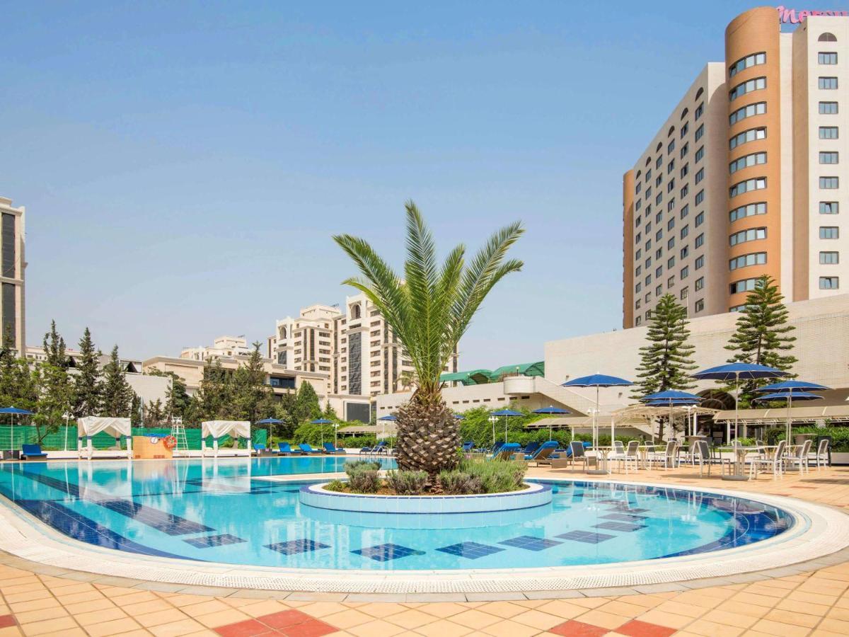 โรงแรมแกรนด์โฮเต็ลเมอร์คูเร่อัลเจอร์ แอร์โร่พอร์ท Maison Blanche ภายนอก รูปภาพ The pool at the hotel