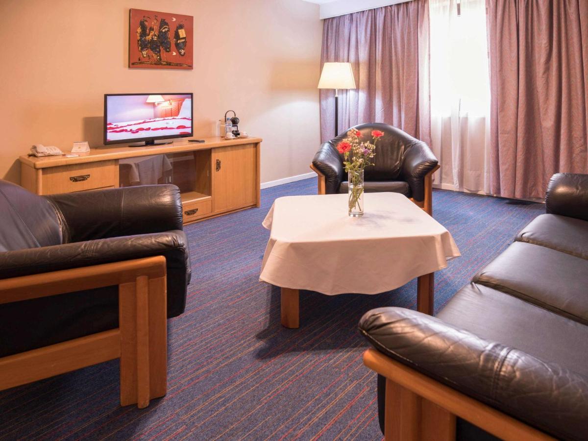 โรงแรมแกรนด์โฮเต็ลเมอร์คูเร่อัลเจอร์ แอร์โร่พอร์ท Maison Blanche ภายนอก รูปภาพ A suite at the hotel