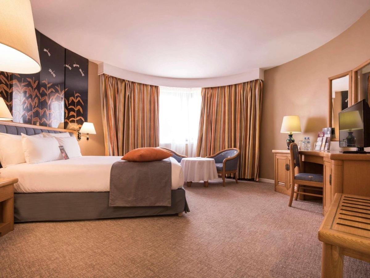 โรงแรมแกรนด์โฮเต็ลเมอร์คูเร่อัลเจอร์ แอร์โร่พอร์ท Maison Blanche ภายนอก รูปภาพ A room at the hotel