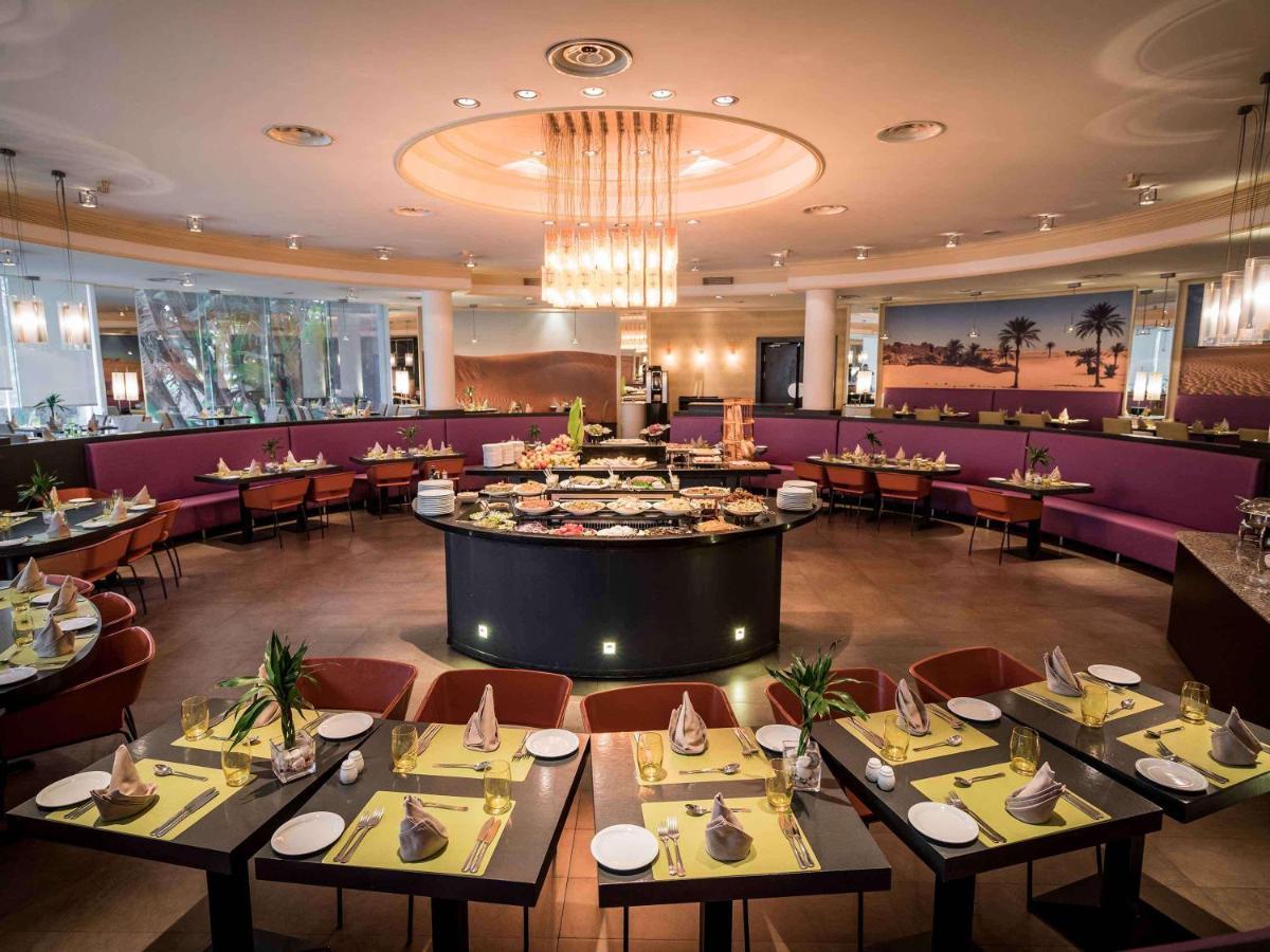โรงแรมแกรนด์โฮเต็ลเมอร์คูเร่อัลเจอร์ แอร์โร่พอร์ท Maison Blanche ภายนอก รูปภาพ The restaurant